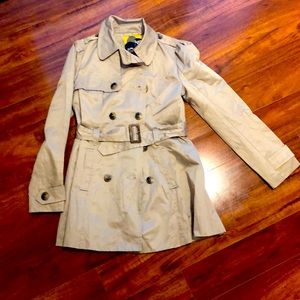 Trench coat with belt and striped lining